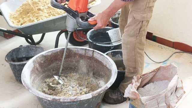Mixing mortar, time lapse