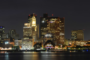 Boston City Skyscrapers and Boston Waterfront at night