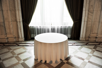 Empty round dinner table