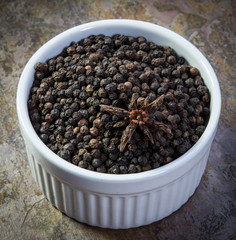 Peppercorns in a ramekin