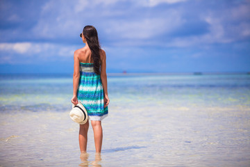 Fototapeta na wymiar Young beautiful woman during beach vacation