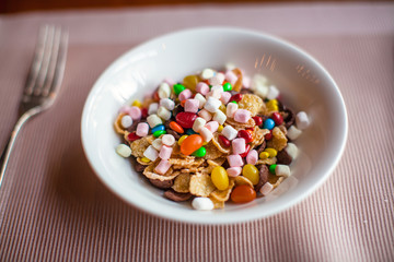 Fresh colorful granola breakfast in open cafe