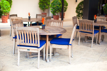 Summer empty open air cafe near swimming pool