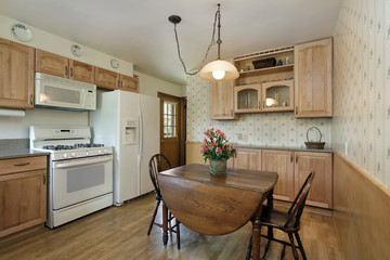 Kitchen with oak wood cabinetry