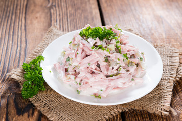 Meat salad (with mayonnaise) on a plate