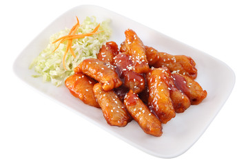 Pork in sour-sweet sauce with salad of fresh cabbage.
