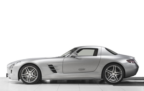 Sport car side view isolated on white background