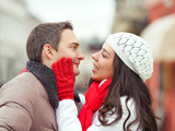 Romantic young couple expresing love outdoors.