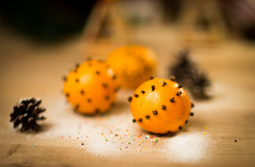 Christmas composition with frosted ripe tangerines