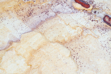 Patterned sandstone texture background.