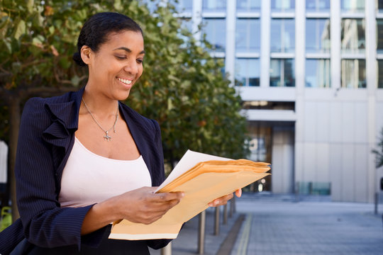 Business Woman Reading Letter