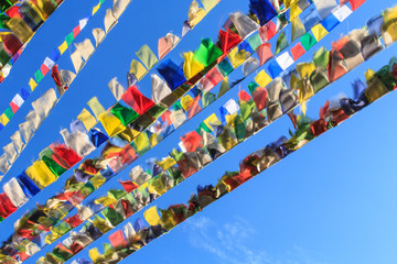 Tibetan prayer flags blowing in the wind