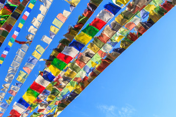 Tibetan prayer flags blowing in the wind