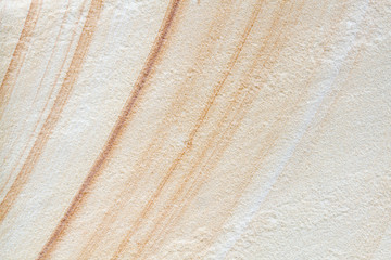 Patterned sandstone texture background.