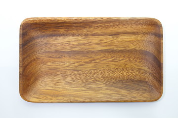 brown wood plate isolated on a white background