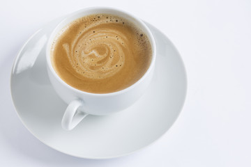 Cup of coffee on a white plate on white background