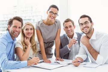 Business people smiling in office