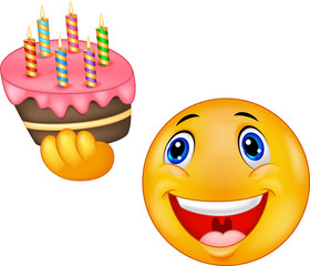Smiley emoticon holding birthday cake