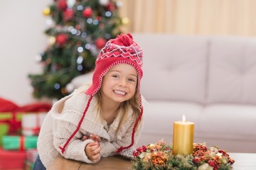 Cute little girl smiling at christmas