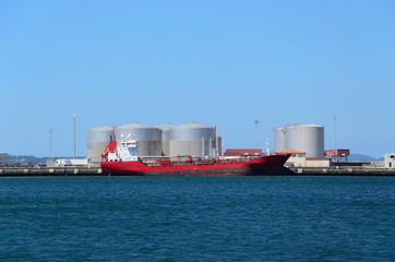 red vessel and tanks