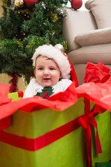 Obraz na płótnie Canvas Cute baby boy in large christmas present