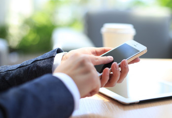 Modern workplace with digital tablet computer and mobile phone