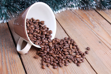 Cup and beans on a wooden table