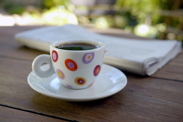 Fototapeta na wymiar coffee cup and morning paper