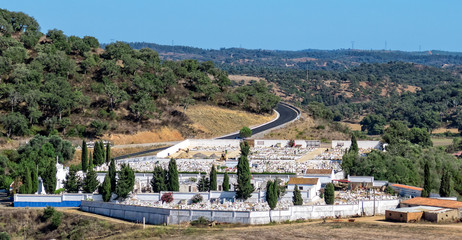 Obraz premium Catholic Cemetery near Small Town