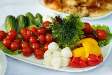 Cut vegetables greens and cheese