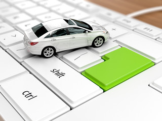 Car over laptop keyboard. Concept