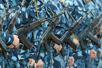 soldiers on parade weapon camouflage military