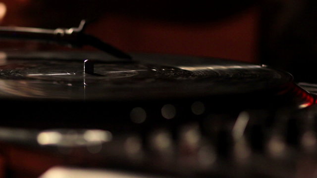 DJ using his turntable