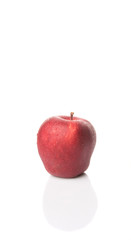 Red apples over white background