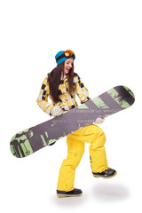 Young woman simulating the guitar playing with snowboard