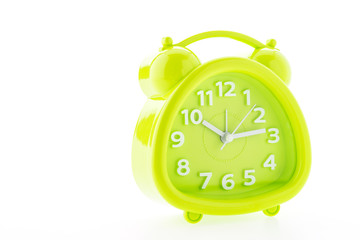 Green alarm clock isolated on white background