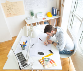 Young architect at his studio