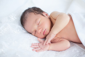 Newborn on white background