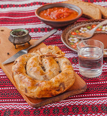 Ring homemade sausage and glasses of vodka