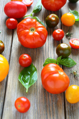 ripe tomatoes loose on a table