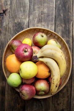 wicker basket full of various fruits