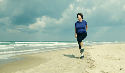 Senior caucasian woman relaxing on the beach