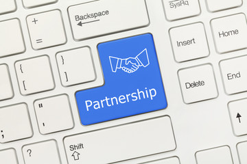 White conceptual keyboard - Partnership (blue key with handshake