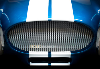 Detail of Grille of Blue and White Striped car