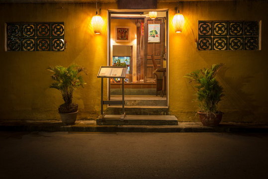 Entry To Old Cafe At Night In Vietnam, Asia.