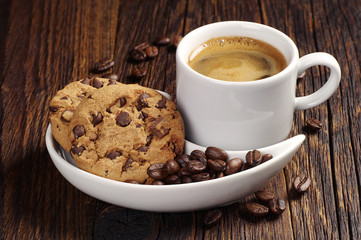 Coffee cup and chocolate cookies