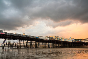 Fototapeta na wymiar Pier in Hastings before fire in 2010, UK.