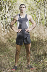 Posing trail runner in nature