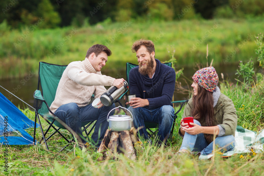 Sticker group of smiling tourists cooking food in camping