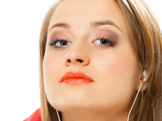 Technology, music - teen girl in earphones